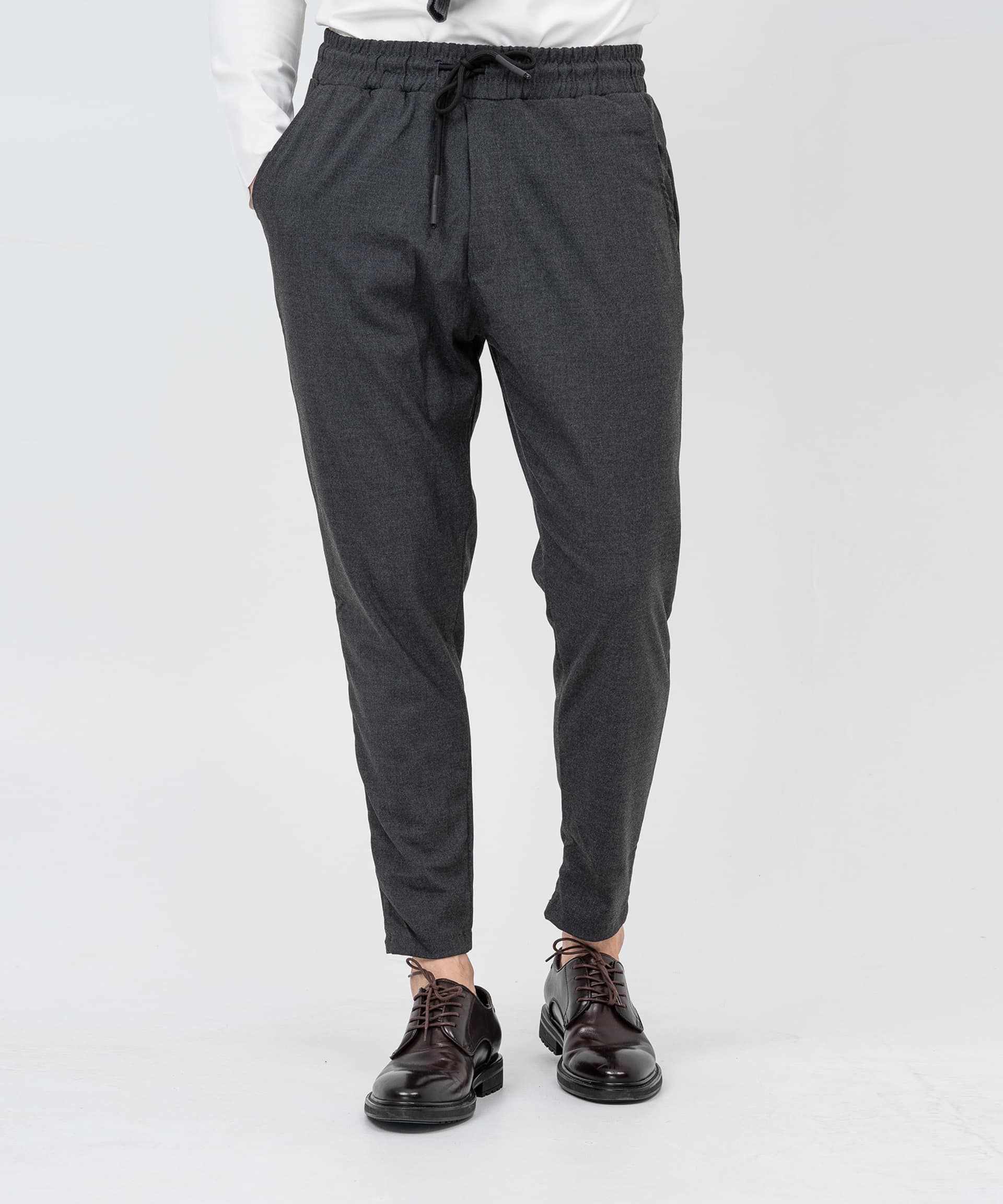 Серые брюки на шнурке